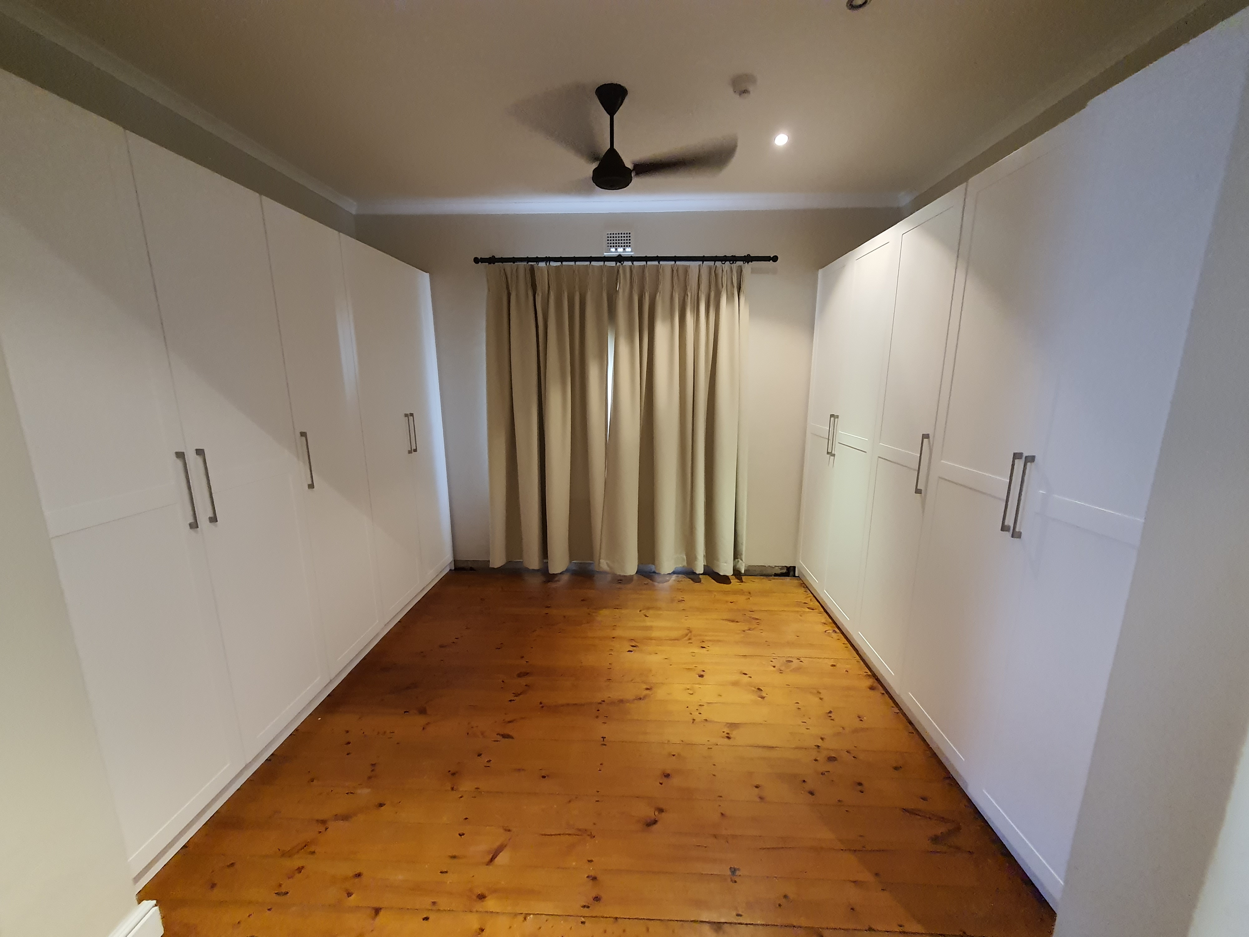Wall-to-Wall Bedroom Cupboards by Cutting Edge Carpenters