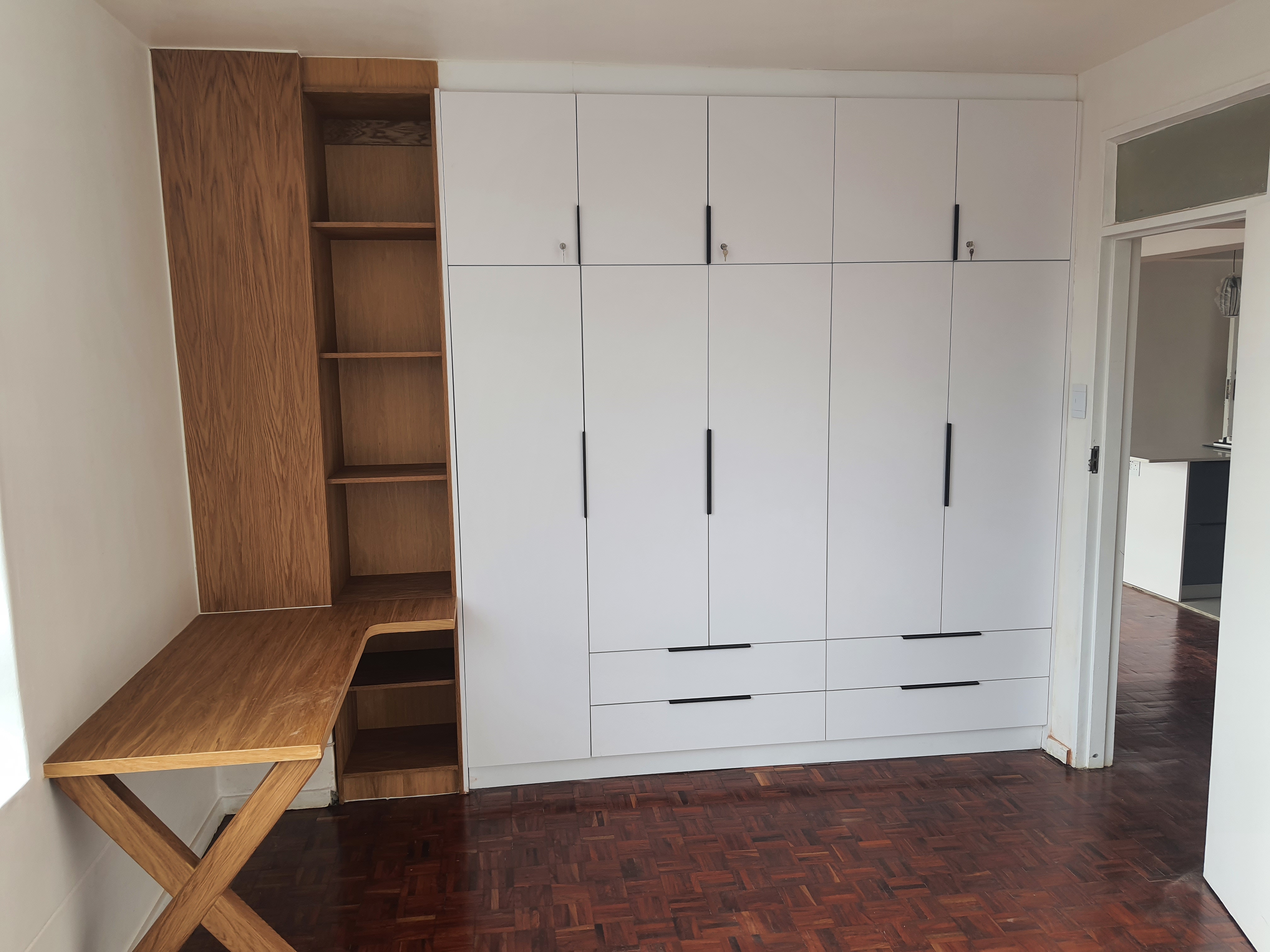 Bedroom Cupboards with Desk by Cutting Edge Carpenters
