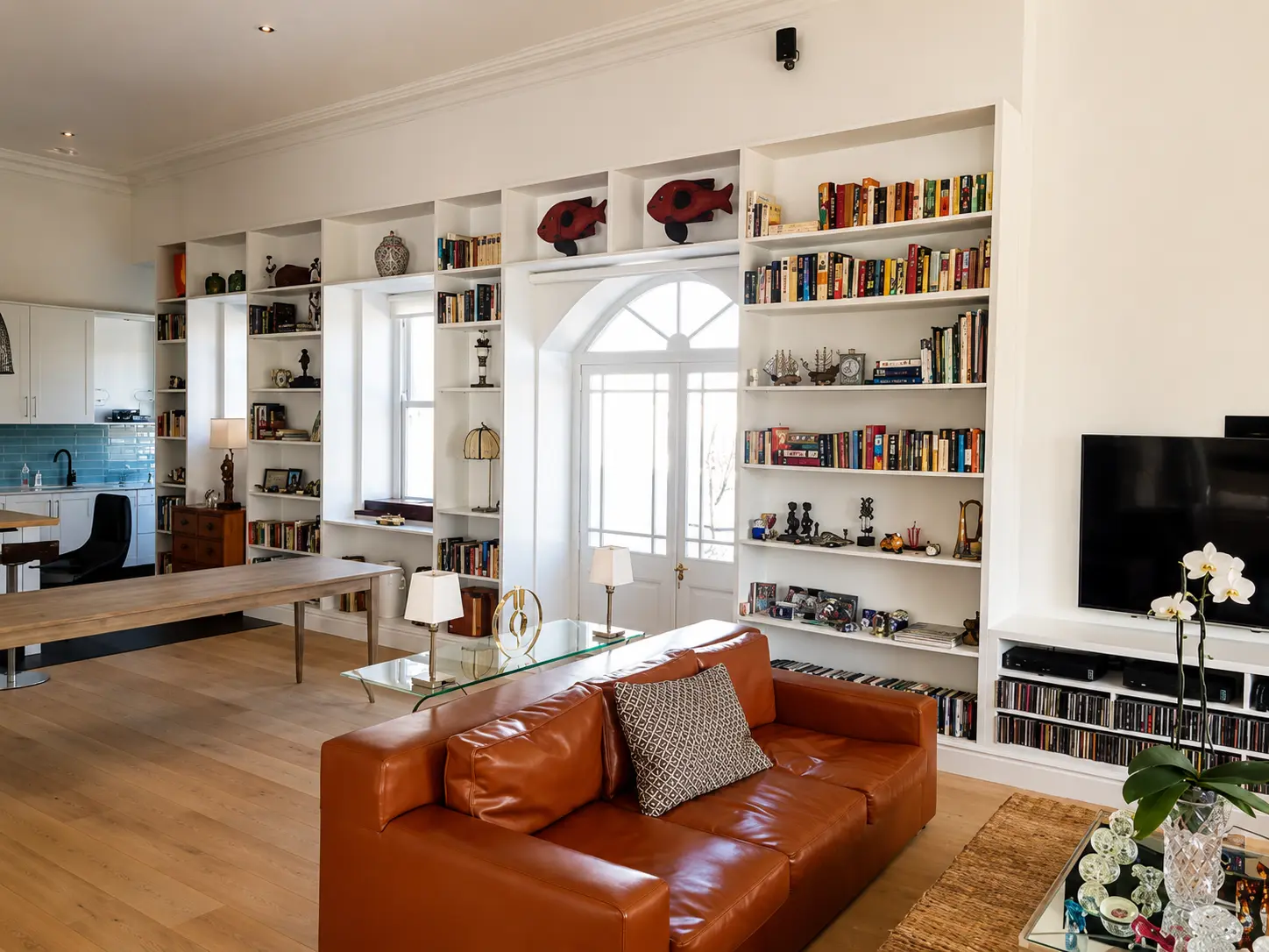 Custom white bedroom cupboards with open shelving