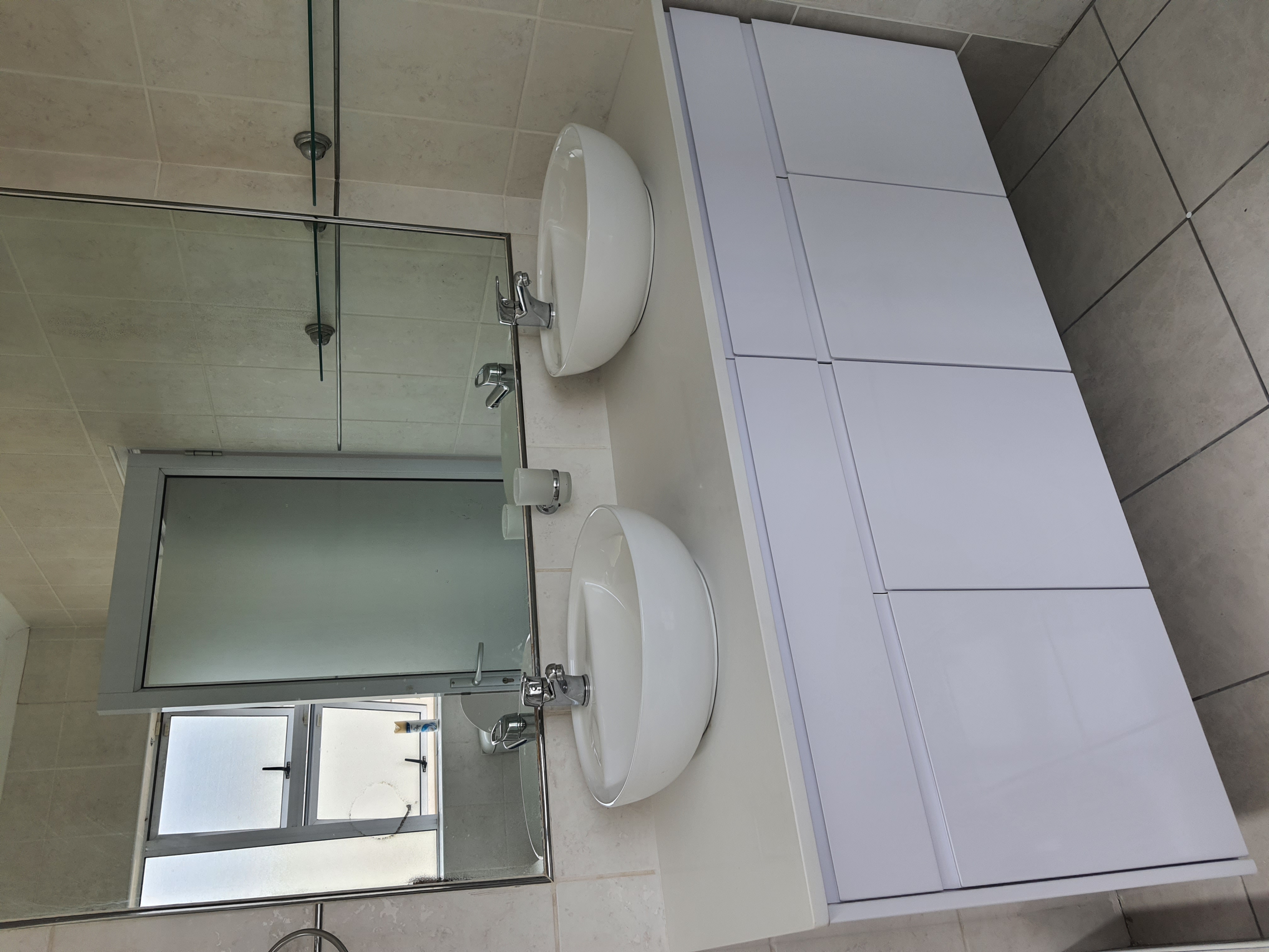 Floating Bathroom Vanity by Cutting Edge Carpenters