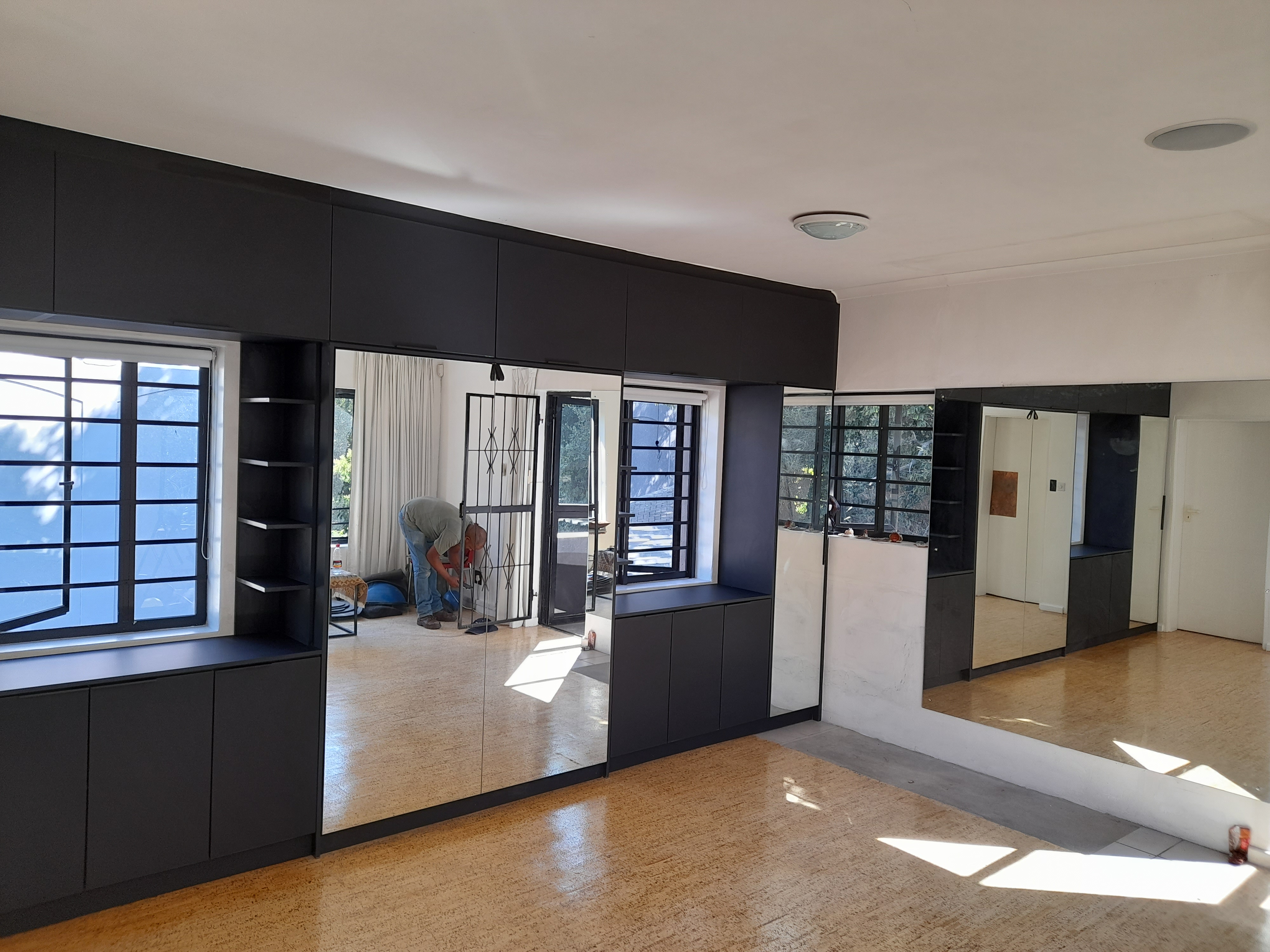 Wall-to-Wall Media Cabinetry by Cutting Edge Carpenters