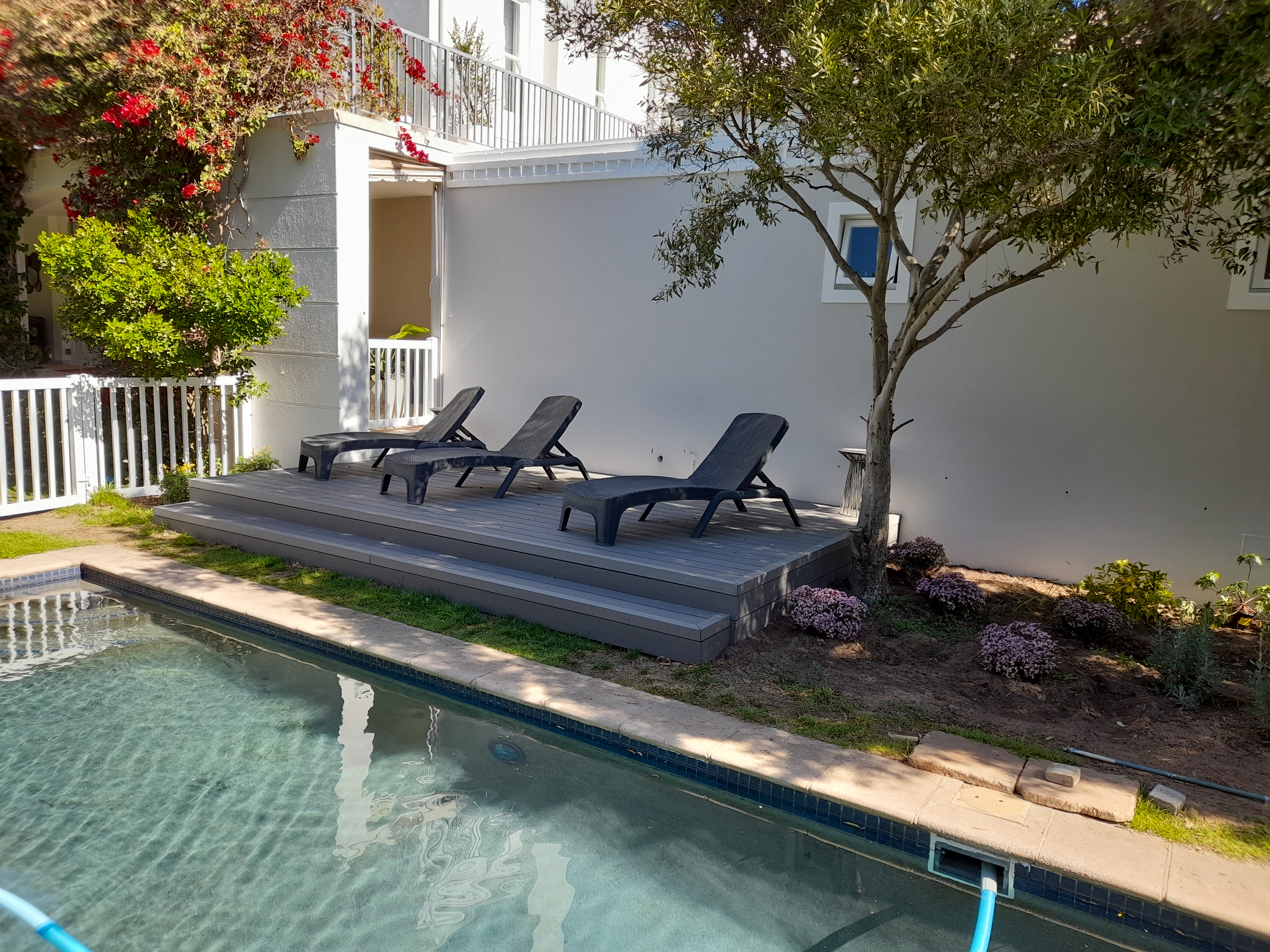 Poolside Deck Platform by Cutting Edge Carpenters