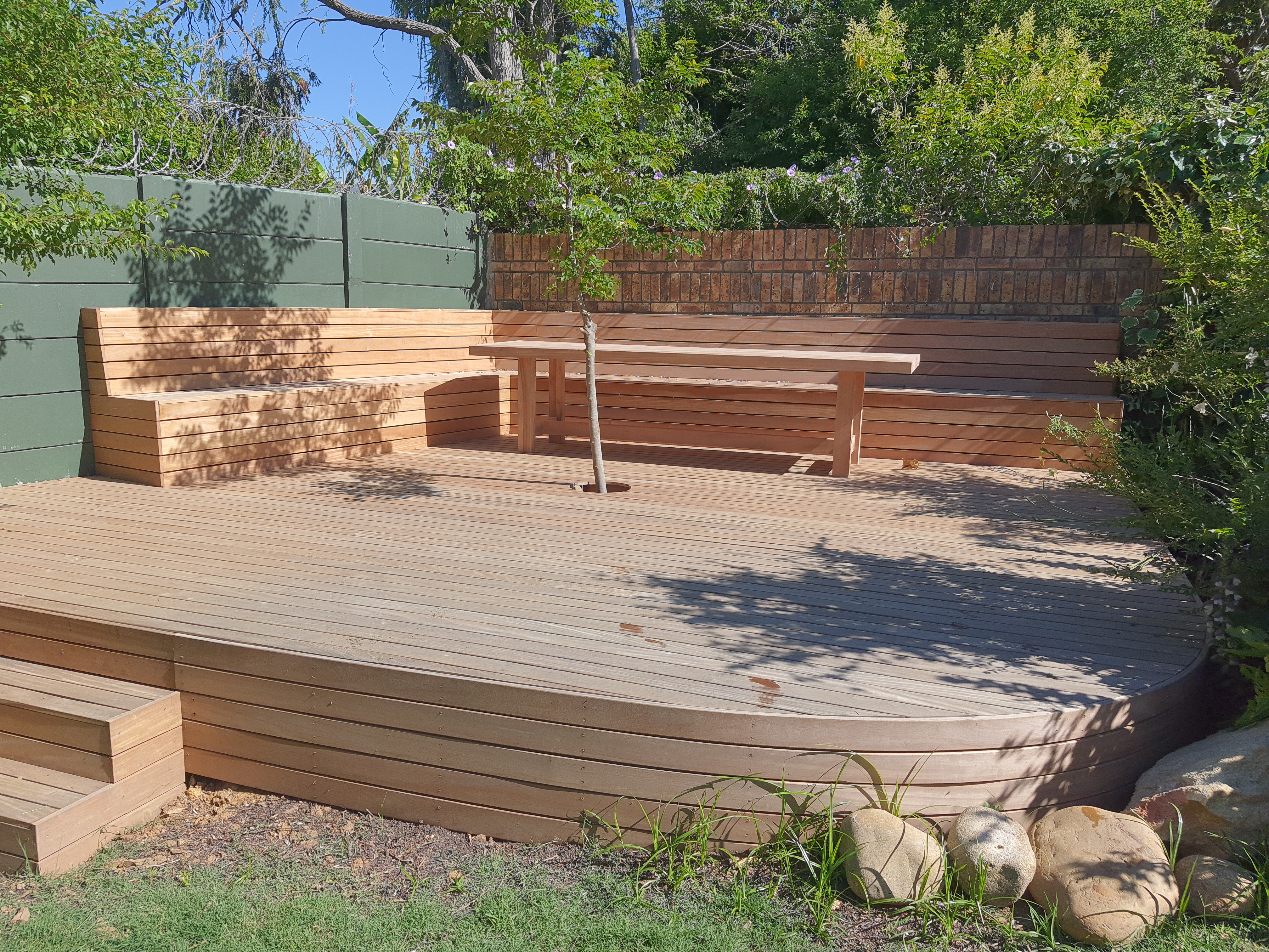 Raised Timber Deck with Seating by Cutting Edge Carpenters