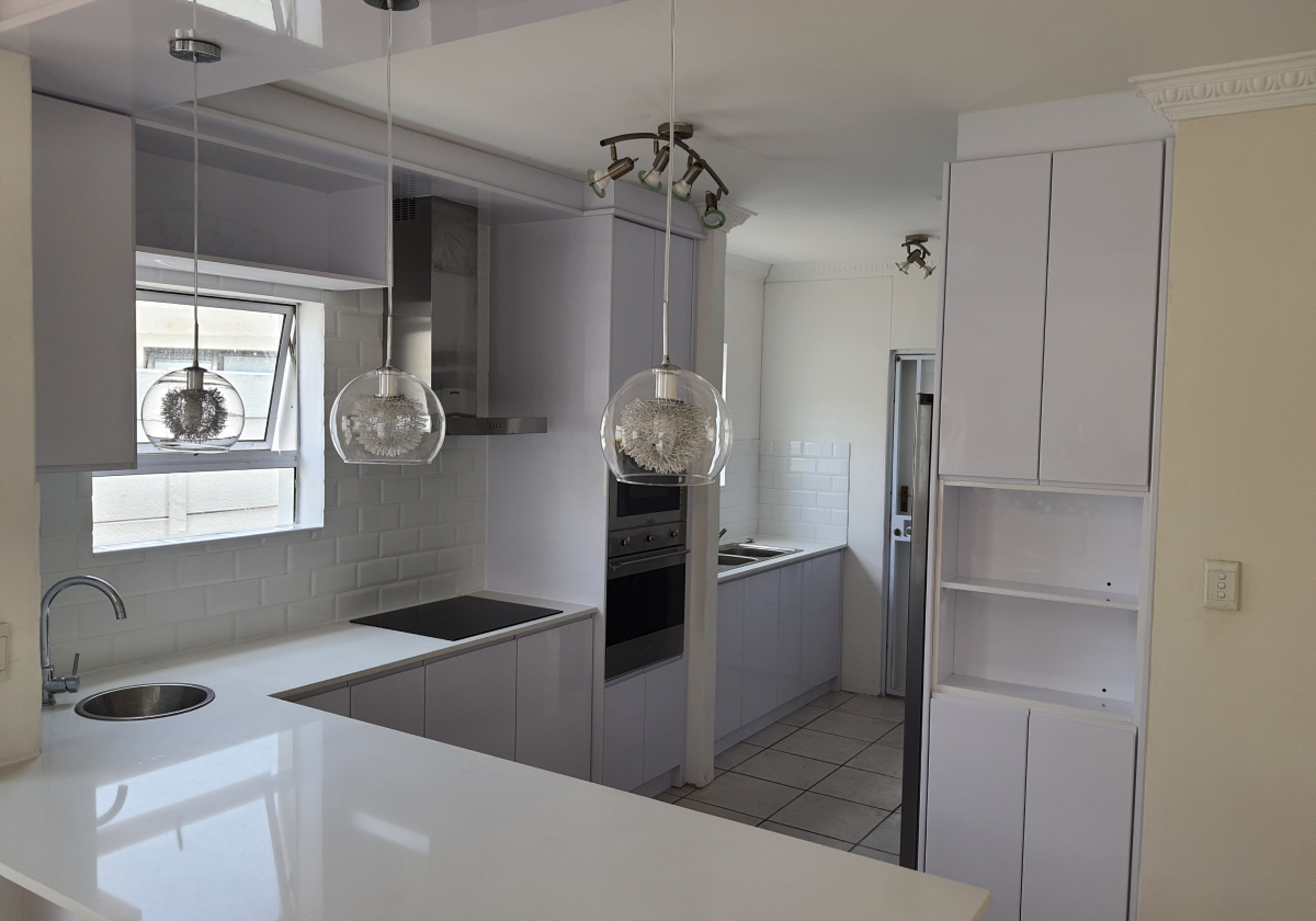 Contemporary White Kitchen by Cutting Edge Carpenters