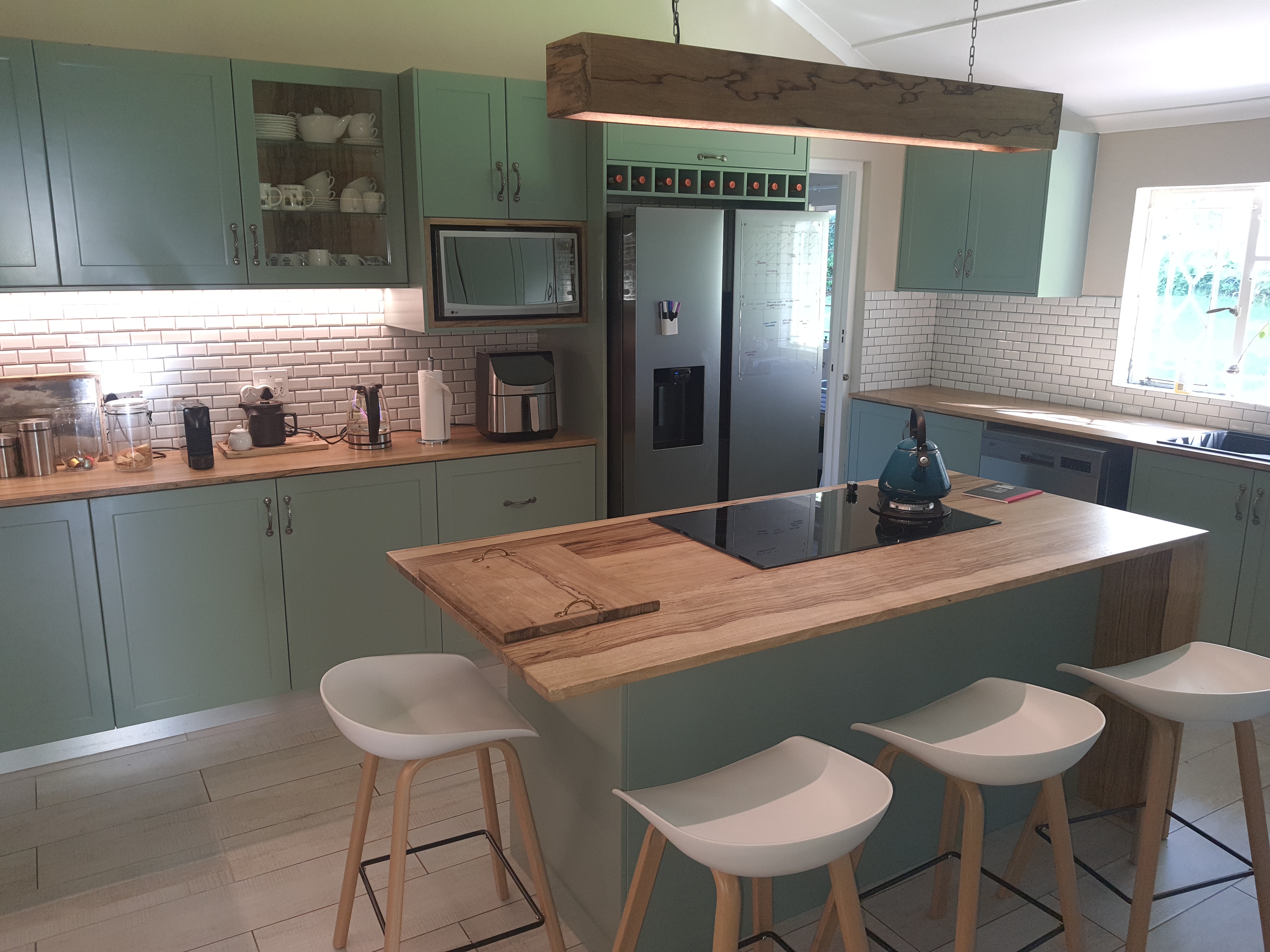 Sage Green Island Kitchen by Cutting Edge Carpenters