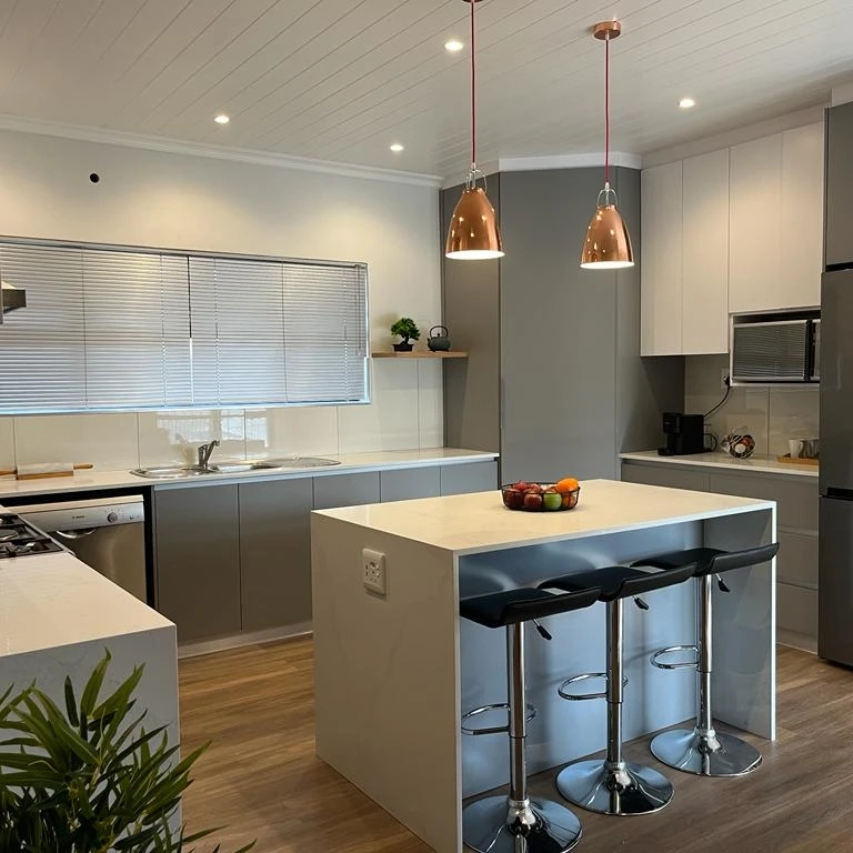 Grey Island Kitchen by Cutting Edge Carpenters