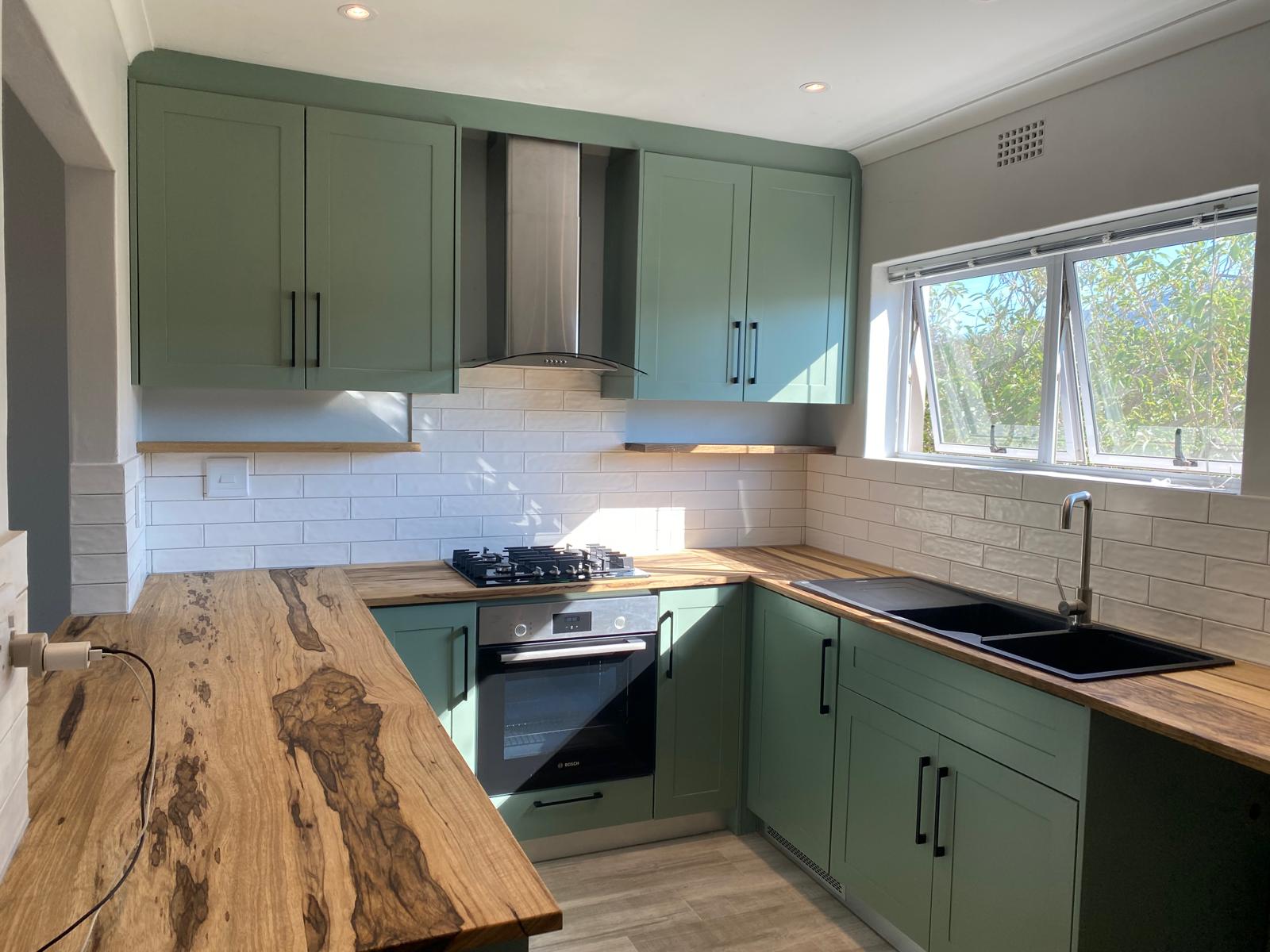 Sage Green Timber-Top Kitchen by Cutting Edge Carpenters